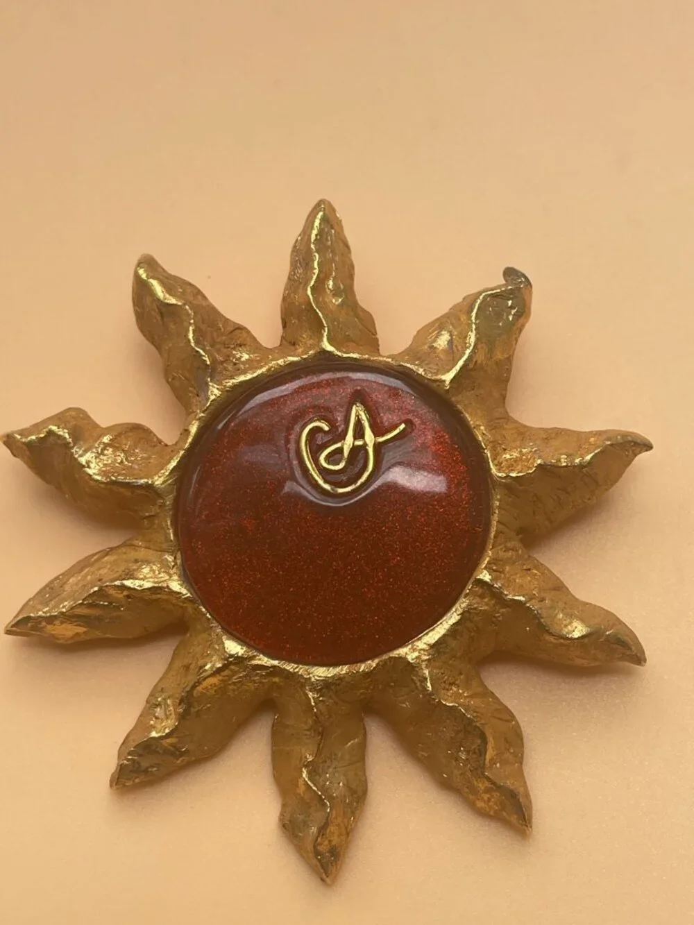 Christian Lacroix Gold-Tone Sun Brooch W/ Red Resin Center & Golden Logo